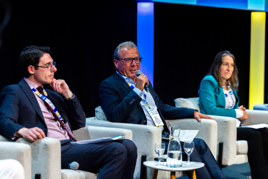 A man speaking in a panel