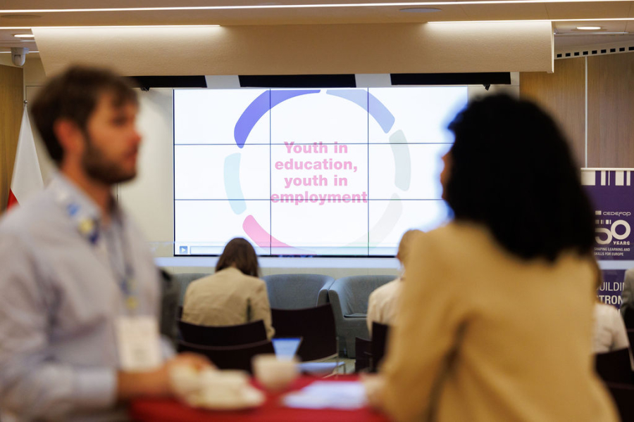 Two people in a conference room